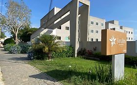 Apartamento Lótus Ar Cond Pertinho FIG e Centro